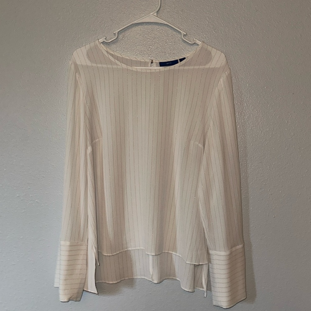 White long sleeve blouse with gold accent lines